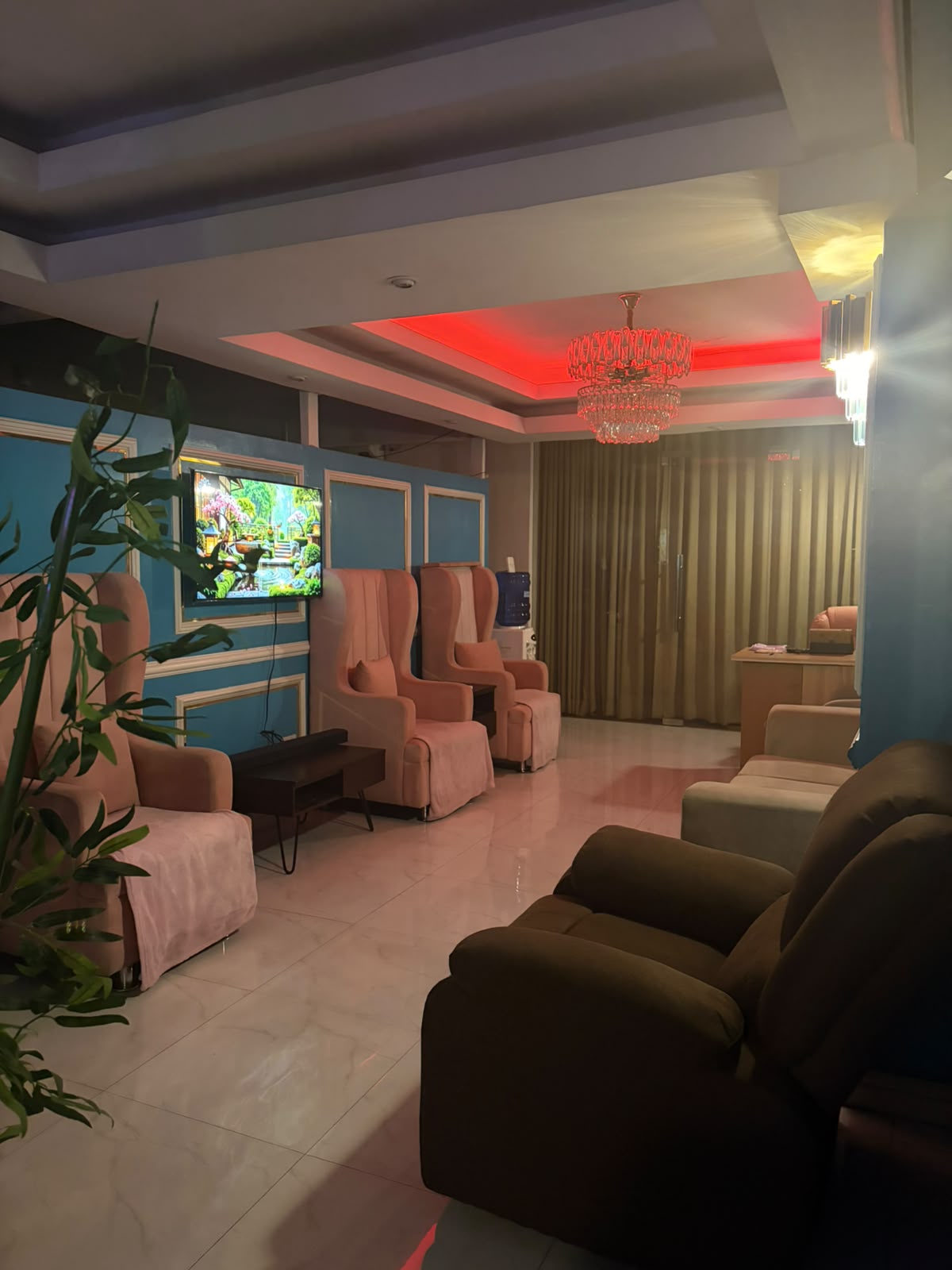 Sue Massage waiting area with chandelier